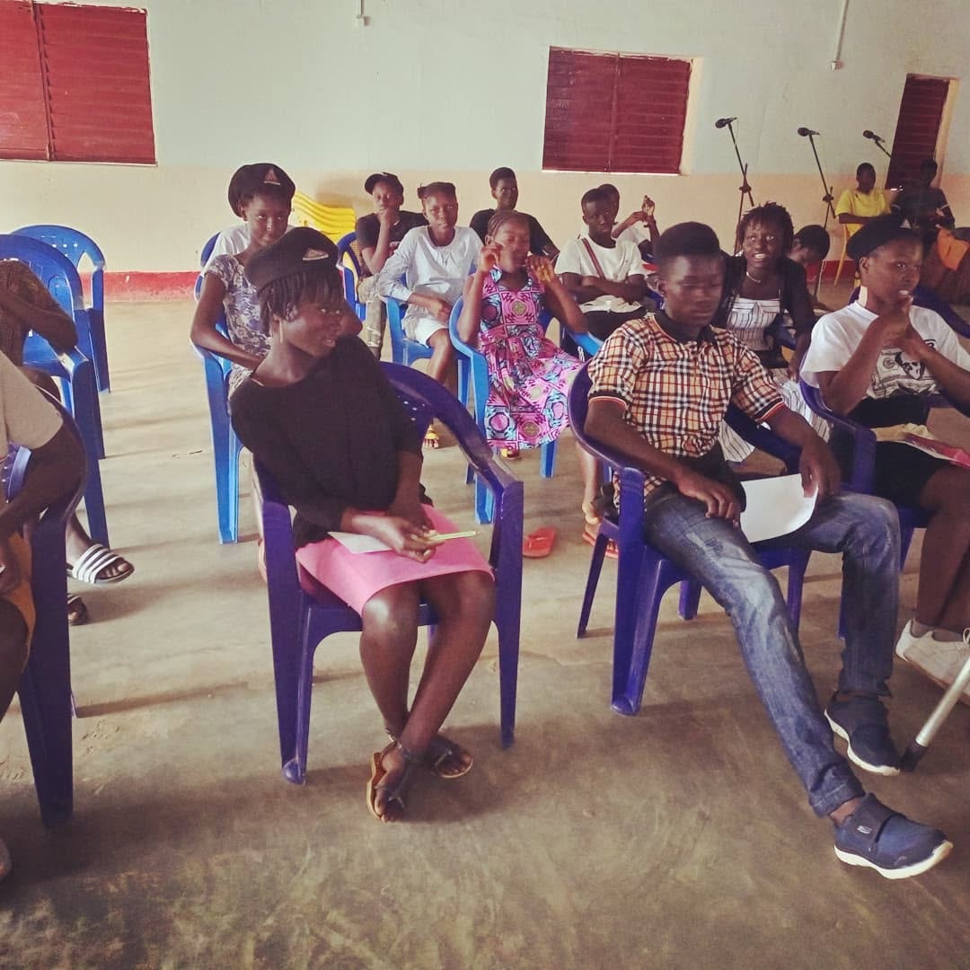 Young people participating in a workshop
